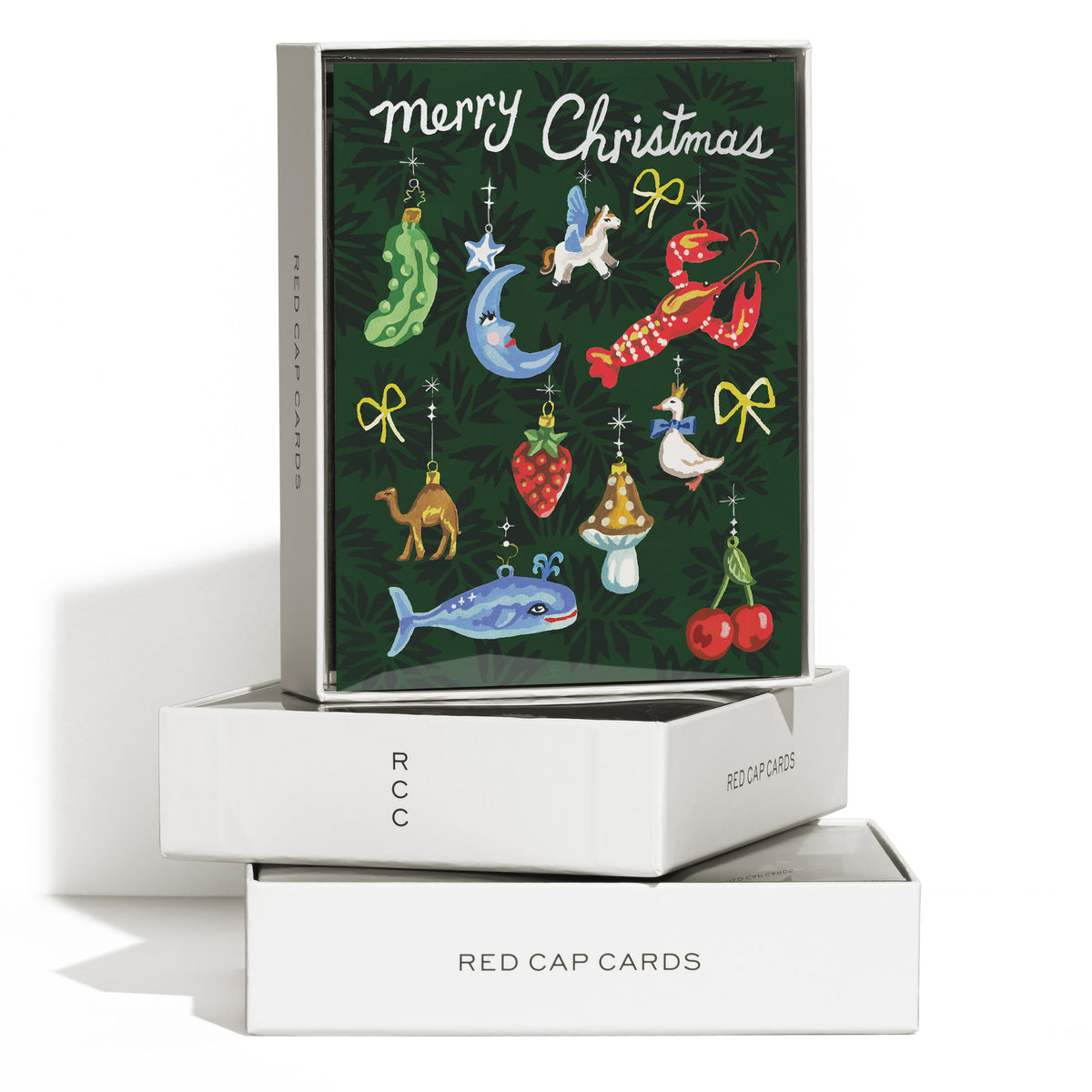Boxed set of 8 'Merry Christmas' cards featuring various colorful ornaments on a green background.