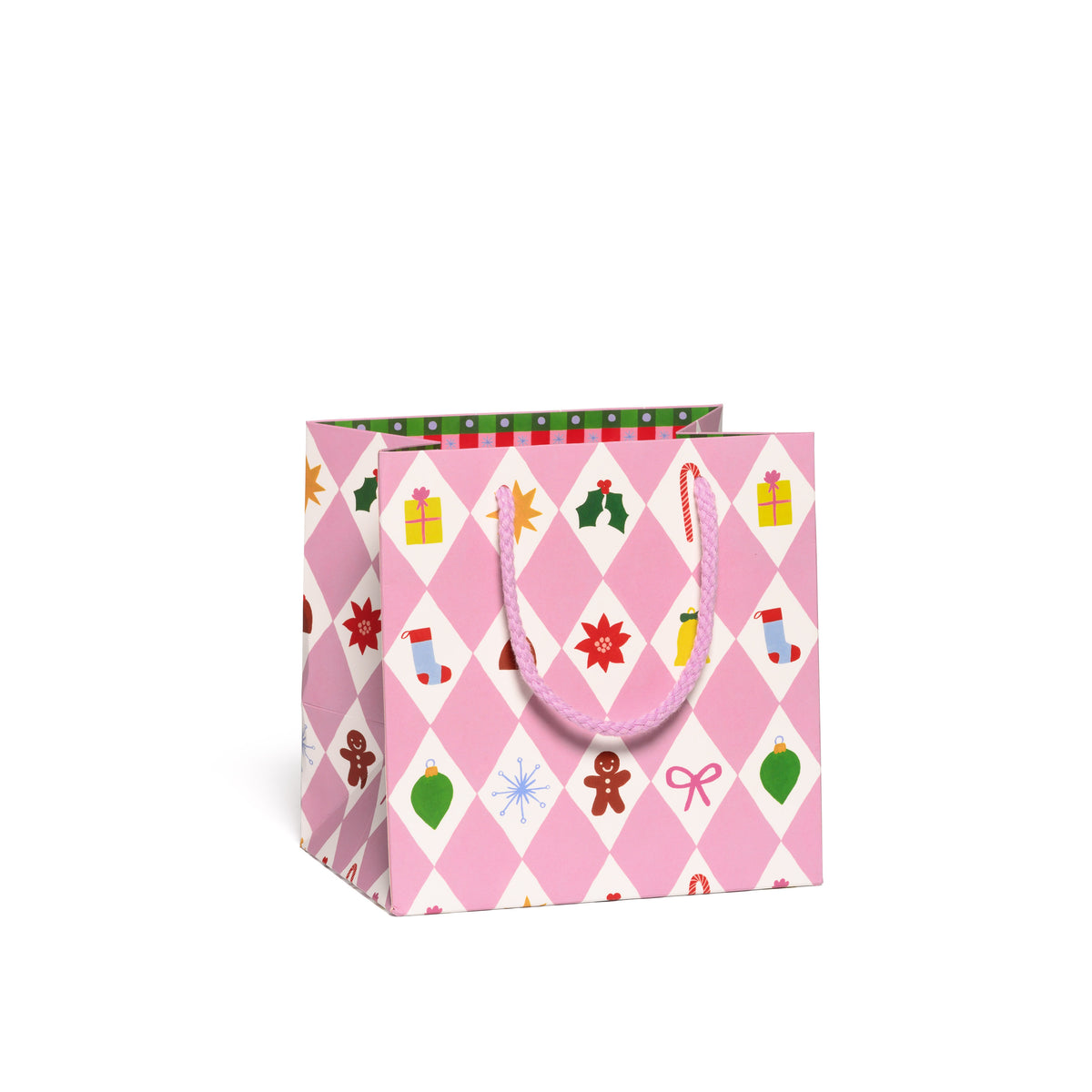 Small pink gift bag with Christmas-themed patterns in white diamond shapes on a white background.