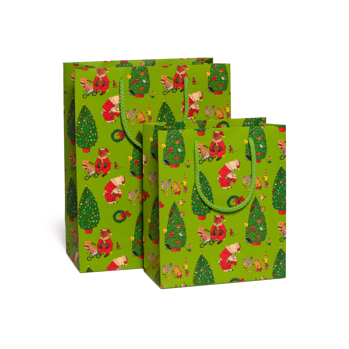 Two Holiday themed green gift bags with festive and animal designs on a green background.