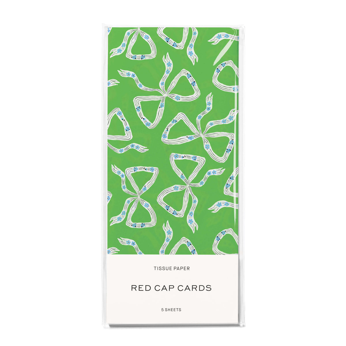 Green tissue paper with white and blue bow design on a white background.